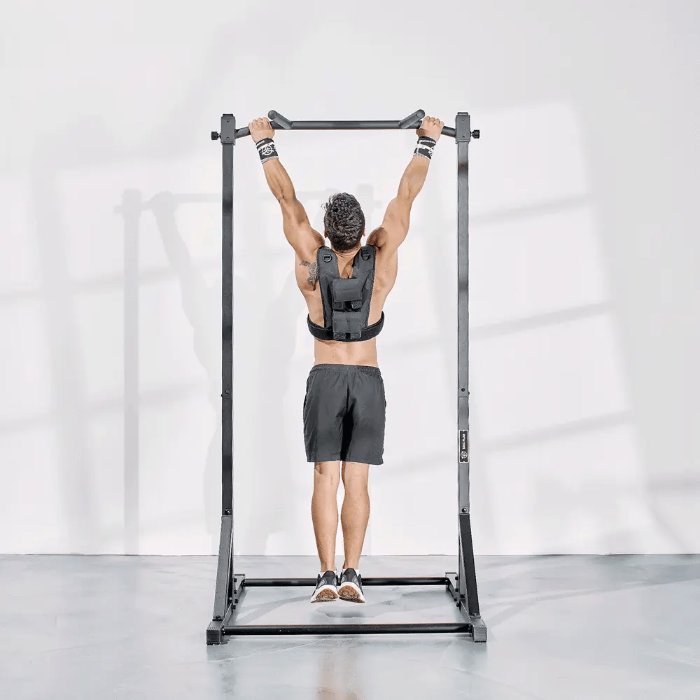 Athlete training dips on pull up bar for home
