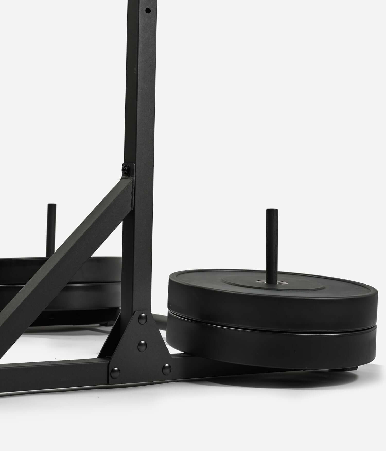 Colonnes de Stabilisation - Barre de Traction avec poids, offrant stabilité pour les entraînements musculaires.