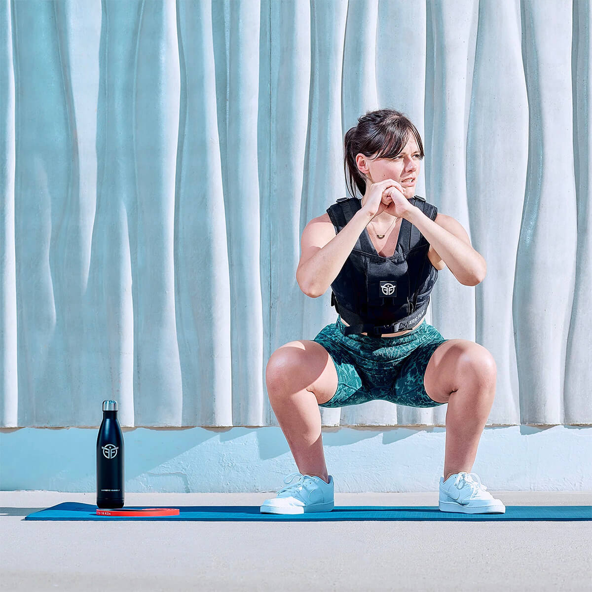 Kniebeuge mit Gewichtsweste eric flag