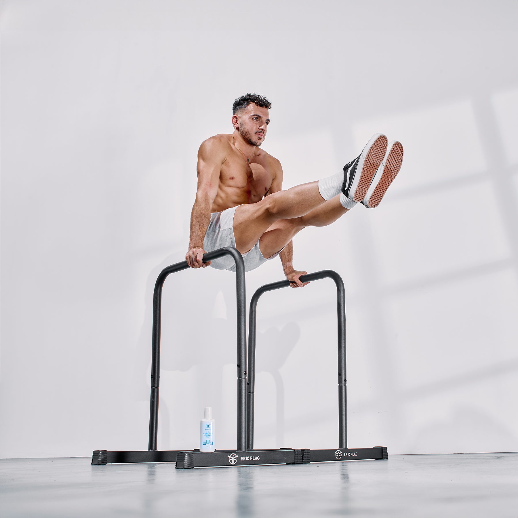 L-sit on dips bars